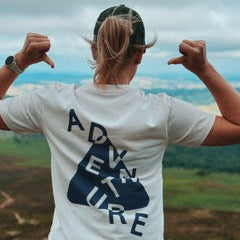 Featuring the signature navy "Adventure" graphic arranged inside a bold triangular shape, this 100% organic cotton tee delivers comfort and style for outdoor lovers. Shown here in our vintage white colorway with a flattering unisex fit.